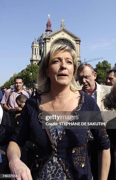 Marine Le Pen daughter of French far-right National Front leader Jean-Marie Le Pen walks on a street prior her father's speech in Paris, 01 May 2007,...