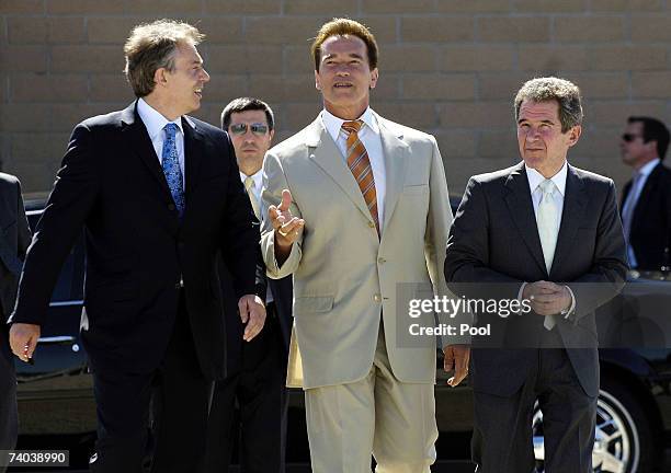 British Prime Minister Tony Blair, California Gov. Arnold Schwarzenegger and BP Chairman Lord Browne talk, on July 31, 2006 at the Port of Long...