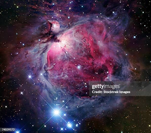 the orion nebula, also known as messier 42 or ngc 1976, is a diffuse nebula situated south of orion's belt. it is one of the brightest nebulae, and is visible to the naked eye in the night sky. - orion belt stock pictures, royalty-free photos & images