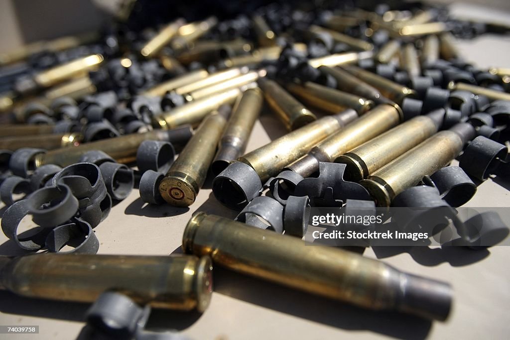 Spent brass and disintegrated links are all that were left of the M-2 .50-caliber portion of the a machine gun shoot with Headquarters Company, Regimental Combat Team 5.