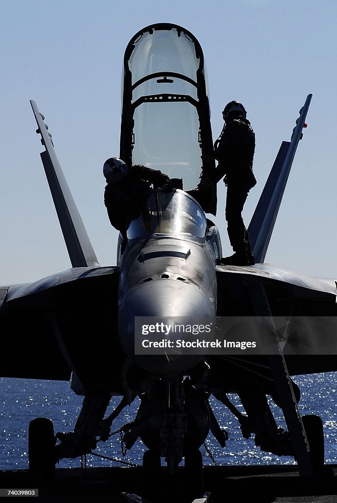 Pacific Ocean (January 23, 2007) - Pilots conducts a pre-flight inspection on an F/A-18F Super Hornet assigned to the Black Knights of Strike Fighter Squadron One Five Four on the flight deck aboard the Nimitz-class aircraft carrier USS John C. Stennis.