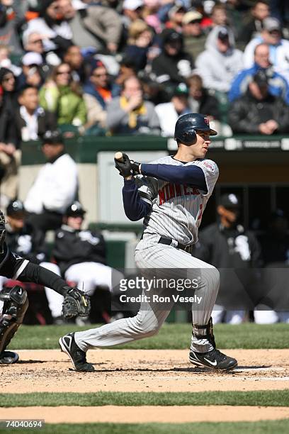 Joe Mauer of the Minnesota Twins bats during the game against the Chicago White Sox at U.S. Cellular Field in Chicago, Illinois on April 8, 2007. The...
