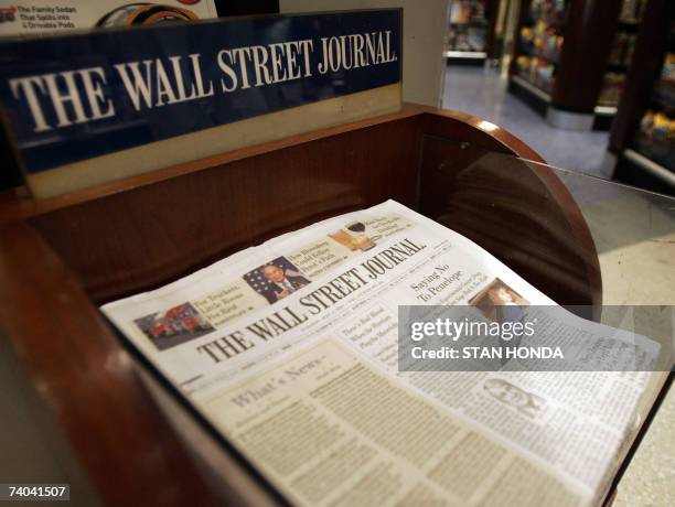 New York, UNITED STATES: The Wall Street Journal is shown on sale at Hudson News, 01 May 2007, in Grand Central Terminal in New York. Rupert...