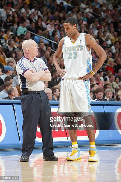 Marcus Camby of the Denver Nuggets talks to referee Joe Crawford during the game against the Los Angeles Lakers on April 9, 2007 at the Pepsi Center...