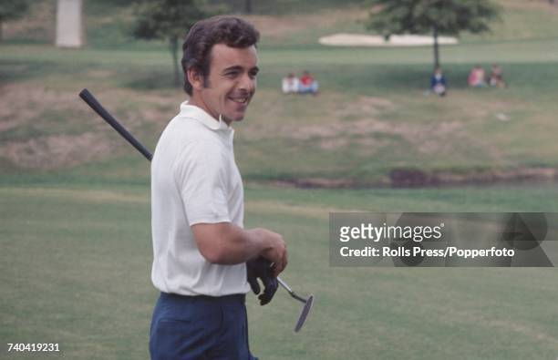 Great Britain Ryder Cup team member, English golfer Tony Jacklin pictured with his putter on a green during play on the first day of the 1971 Ryder...