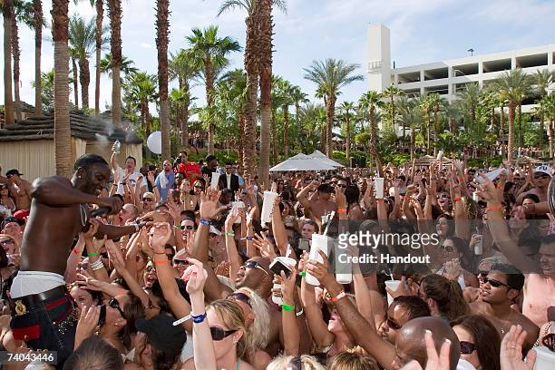 In this photo provided by NightVissions, rapper Akon performs on the opening day for ReHab at The Hard Rock Hotel & Casino April 29, 2007 in Las...