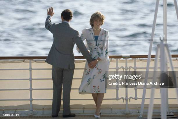 The Prince and Princess of Wales leave Gibraltar on the Royal Yacht Britannia for their honeymoon cruise, 31st July 1981. The Princess wears a Donald...