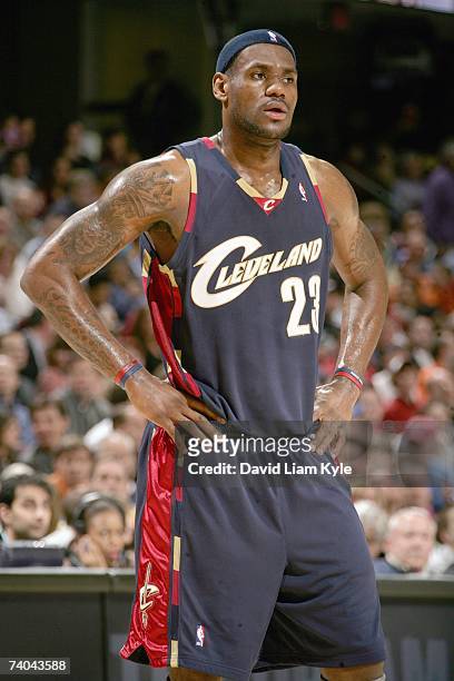 LeBron James of the Cleveland Cavaliers stands on the court during the NBA game against the New Jersey Nets at Quicken Loans Arena on April 12, 2007...