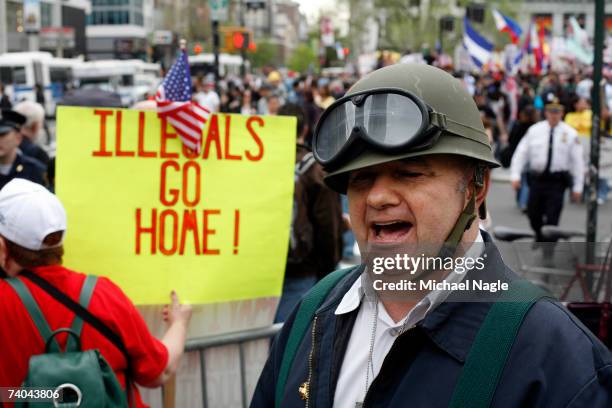 Anti-immigration demonstrators protest across the street from an immigration reform rally in Union Square May 1, 2007 in New York City. The protest...