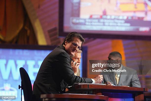 Mel Kiper, Chris Mortensen and Keyshawn Johnson broadcast for ESPN during the 2007 NFL Draft on April 28, 2007 at Radio City Music Hall in New York,...
