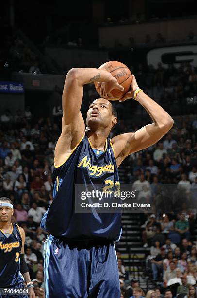 Marcus Camby of the Denver Nuggets shoots a free throw against the San Antonio Spurs in Game Two of the Western Conference Quarterfinals during the...