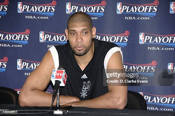 Tim Duncan of the San Antonio Spurs talks to the media following the game against the Denver Nuggets in Game Two of the Western Conference...