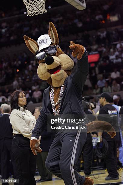 San Antonio Spurs mascot The Coyote performs during the game against the Denver Nuggets in Game Two of the Western Conference Quarterfinals during...