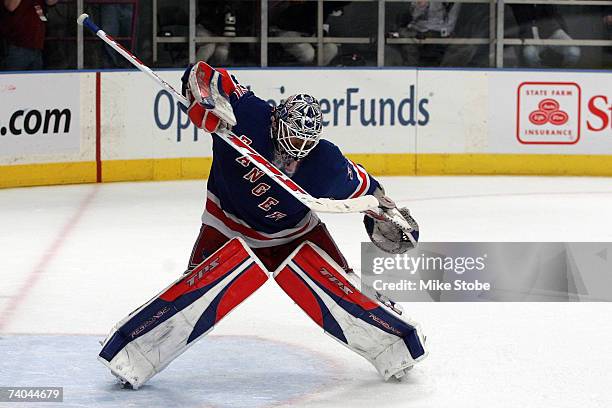 Henrik Lundqvist of the New York Rangers celebrates after defeating the Buffalo Sabres 2-1 to take Game Four of the 2007 Eastern Conference...