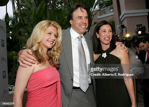 Actor Kevin Nealon and his wife Susan Yeagley with actress Mimi Rogers arrive to the celebration honoring Geena Davis as this year's Hollywood Hero...