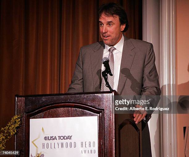 Actor Kevin Nealon speaks during the celebration honoring Geena Davis as this year's Hollywood Hero by USA Today for the See Jane Program at the...