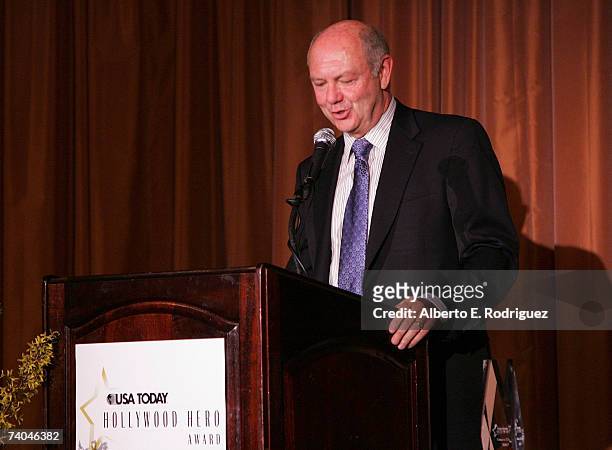 Craig A. Moon, president and publisher of USA Today, speaks onstage during the celebration honoring Geena Davis as this year's Hollywood Hero by USA...