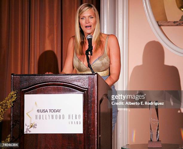Actress Natasha Henstridge speaks onstage during the celebration honoring Geena Davis as this year's Hollywood Hero by USA Today for the See Jane...