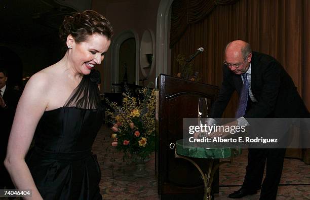 Actress Geena Davis and Craig A. Moon, president and publisher of USA Today, pose onstage during the celebration honoring Geena Davis as this year's...