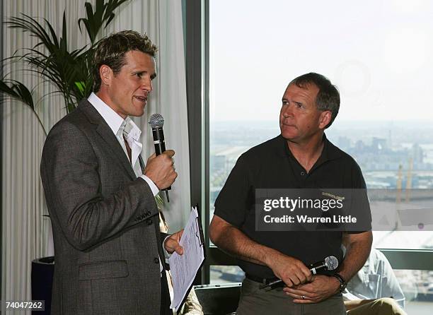 Olympian and Air Race TV Host, James Cracknell speaks with pilot Nigel Lamb during a Press Conference at Canada Square on May 2, 2007 in London,...