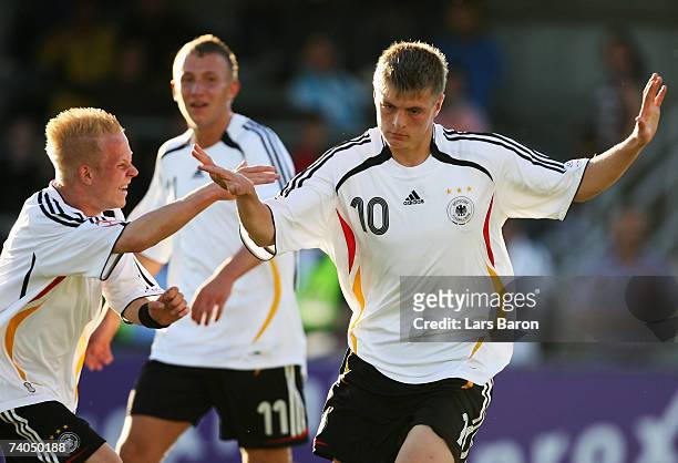 Toni Kroos of Germany celebrates scoring the second goal with team mate Sascha Bigalke during the 2007 UEFA European Under 17 Championship Group A...