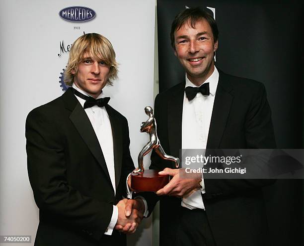 David Strettle of NEC Harlequins receives the PRA Mercedes-Benz Young Player of the Year & the Nick Duncombe Memorial award from Simon Oldfield,...