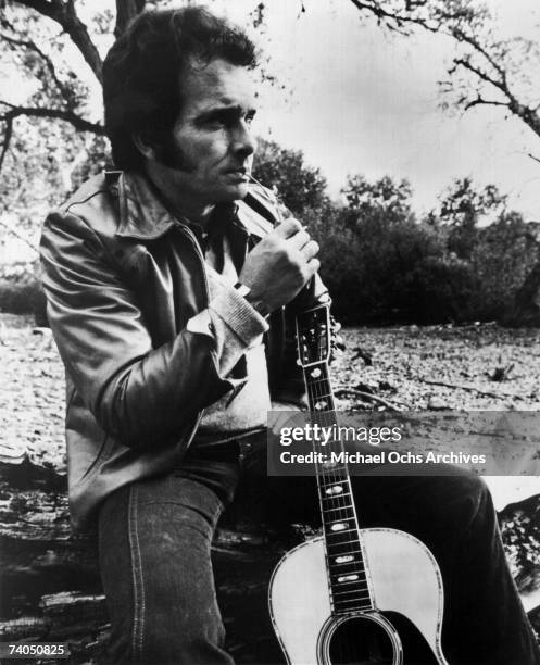 Country musician Merle Haggard poses for a mid 1970's candid portrait.