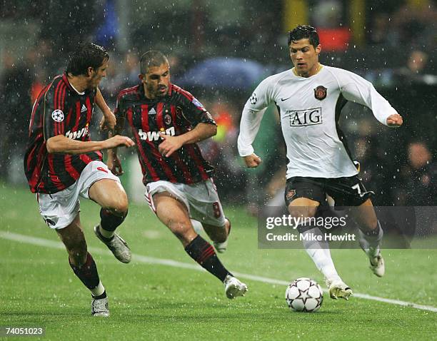 Cristiano Ronaldo of Manchester United takes on Massimoo Oddo and Gennaro Gattuso of AC Milan during the UEFA Champions League semi final, second leg...