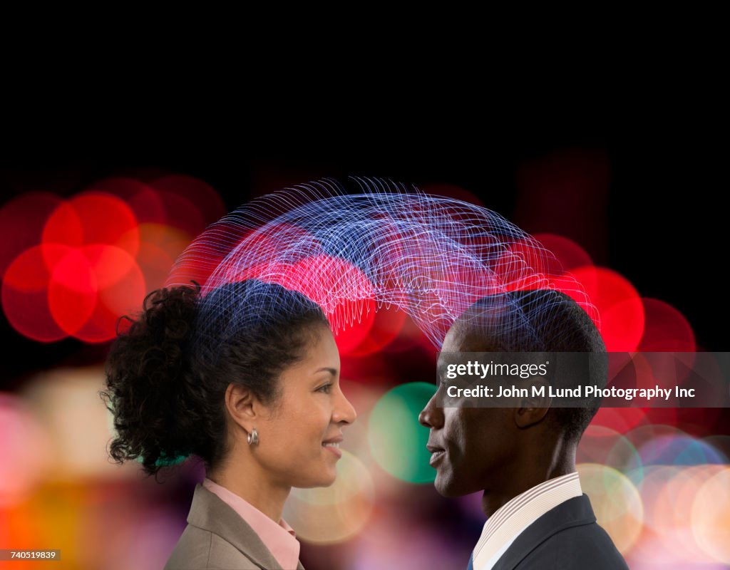 Man and woman communicating using telepathy