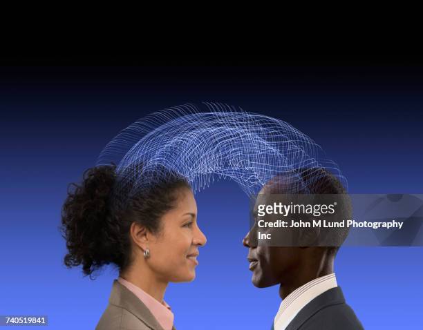 man and woman communicating using telepathy - mind reading stock pictures, royalty-free photos & images