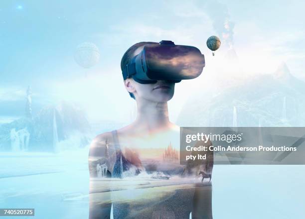 pacific islander woman wearing virtual reality goggles - augmented reality animal stock-fotos und bilder