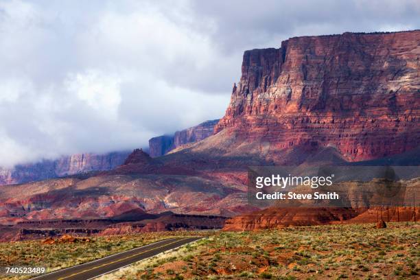 scenic view of road in desert landscape - flagstaff arizona stock pictures, royalty-free photos & images