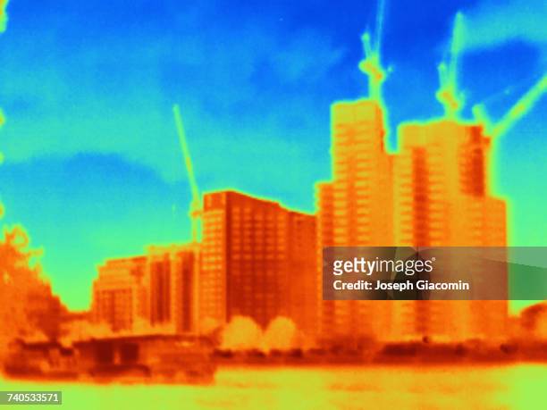 thermal photograph of skyscrapers and construction cranes, london, uk - thermal imaging stock pictures, royalty-free photos & images