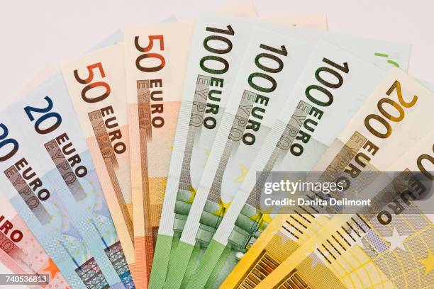 close-up of different euro notes - two hundred euro banknote stock pictures, royalty-free photos & images