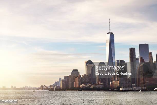 cityscape and skyline with one world trade centre, lower manhattan, new york, usa - lower manhattan stock pictures, royalty-free photos & images