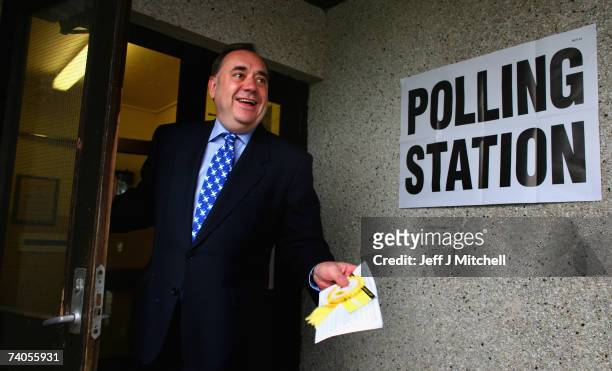 Alex Salmond leader of the SNP walks into a polling station to vote in the Scottish Parliamentry elections May3, 2007 in Strichen, Scotland. Polling...