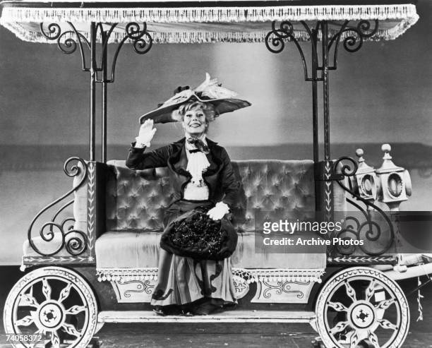 American actress and singer Carol Channing stars in the musical 'Hello Dolly!' at the St James Theatre, New York City, circa 1964. The musical was...
