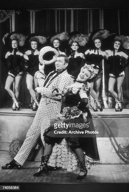 Collette Lyons as Ellie and Buddy Ebsen as Frank in a performance of the musical 'Show Boat' at the Ziegfeld Theatre, New York, 1946. Act II, Scene...