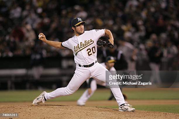 Huston Street of the Oakland Athletics pitches during the game against the New York Yankees at the McAfee Coliseum in Oakland, California on April...