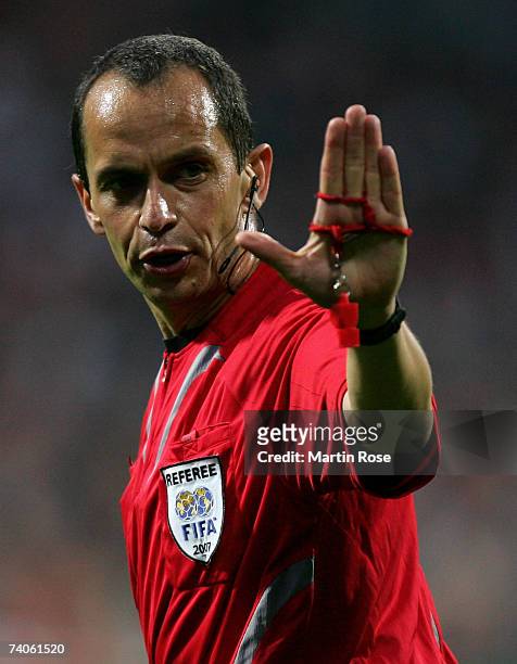 Referee Bertrand Layec gestures during the UEFA Cup semi-final, 2nd leg match between Werder Bremen and Espanyol at the Weser stadium on May 3, 2007...