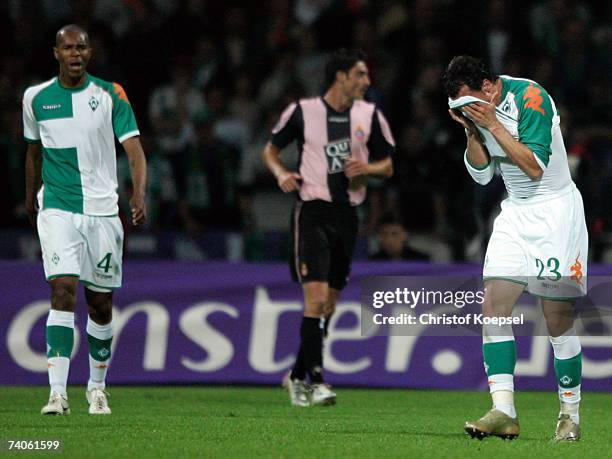 Naldo and Hugo Almeida of Bremen looks rejected after Espanyol's second goal during the UEFA Cup Semi-Final, second Leg match between Werder Bremen...