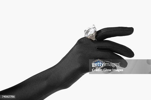 close-up of a person's hand with two rings - formal glove bildbanksfoton och bilder