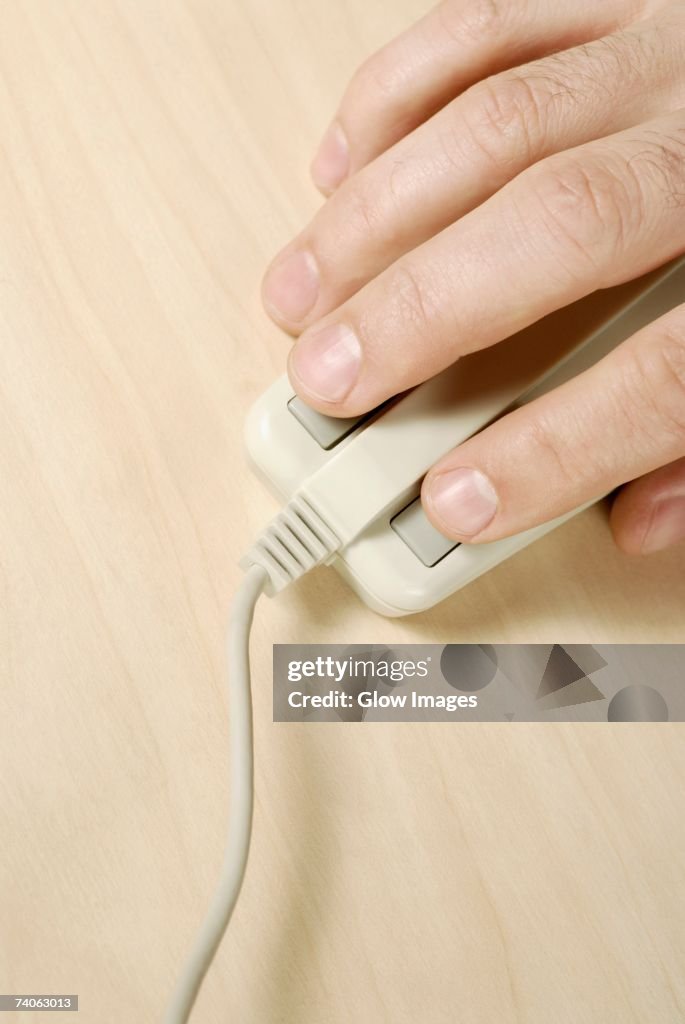 Small Hand Using Mouse Closeup Of A Persons Hand Using A Computer Mouse High-Res Stock Photo ...