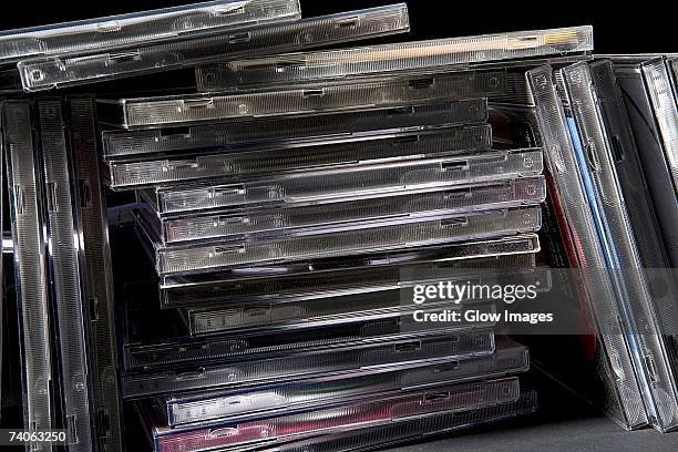 close-up of a stack of cd cases - cd case stock pictures, royalty-free photos & images