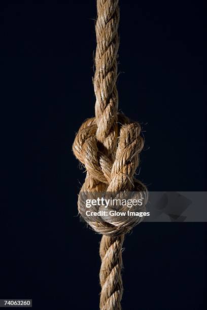 close-up of a knot on a rope - tangled stock-fotos und bilder