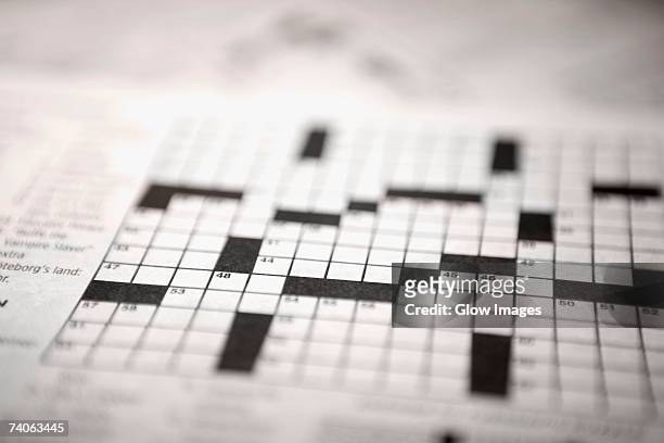 close-up of a crossword puzzle - korsord bildbanksfoton och bilder