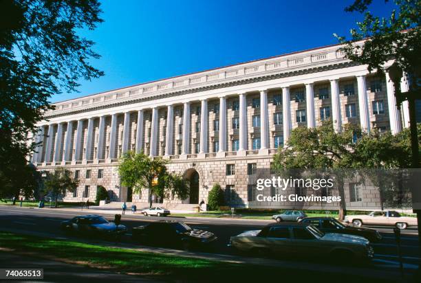 facade of a government building, internal revenue service building, washington dc, usa - internal revenue service stock-fotos und bilder