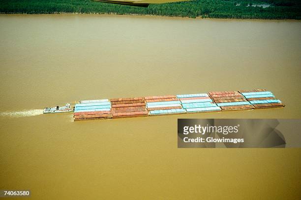 aerial view of grain barges on the river, mississippi river, new orleans, louisiana, usa - tug barge stock pictures, royalty-free photos & images