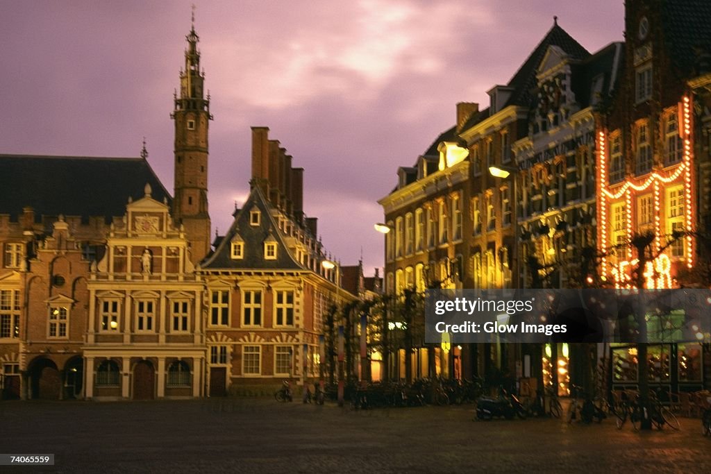 Buildings lit up at night, Town Square, Netherlands