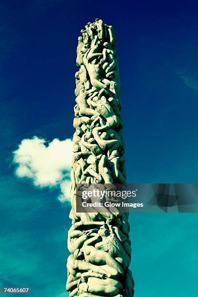 low angle view of sculptures carved on a column, gustav vigeland sculpture park, oslo, norway - gustav vigeland sculpture park bildbanksfoton och bilder